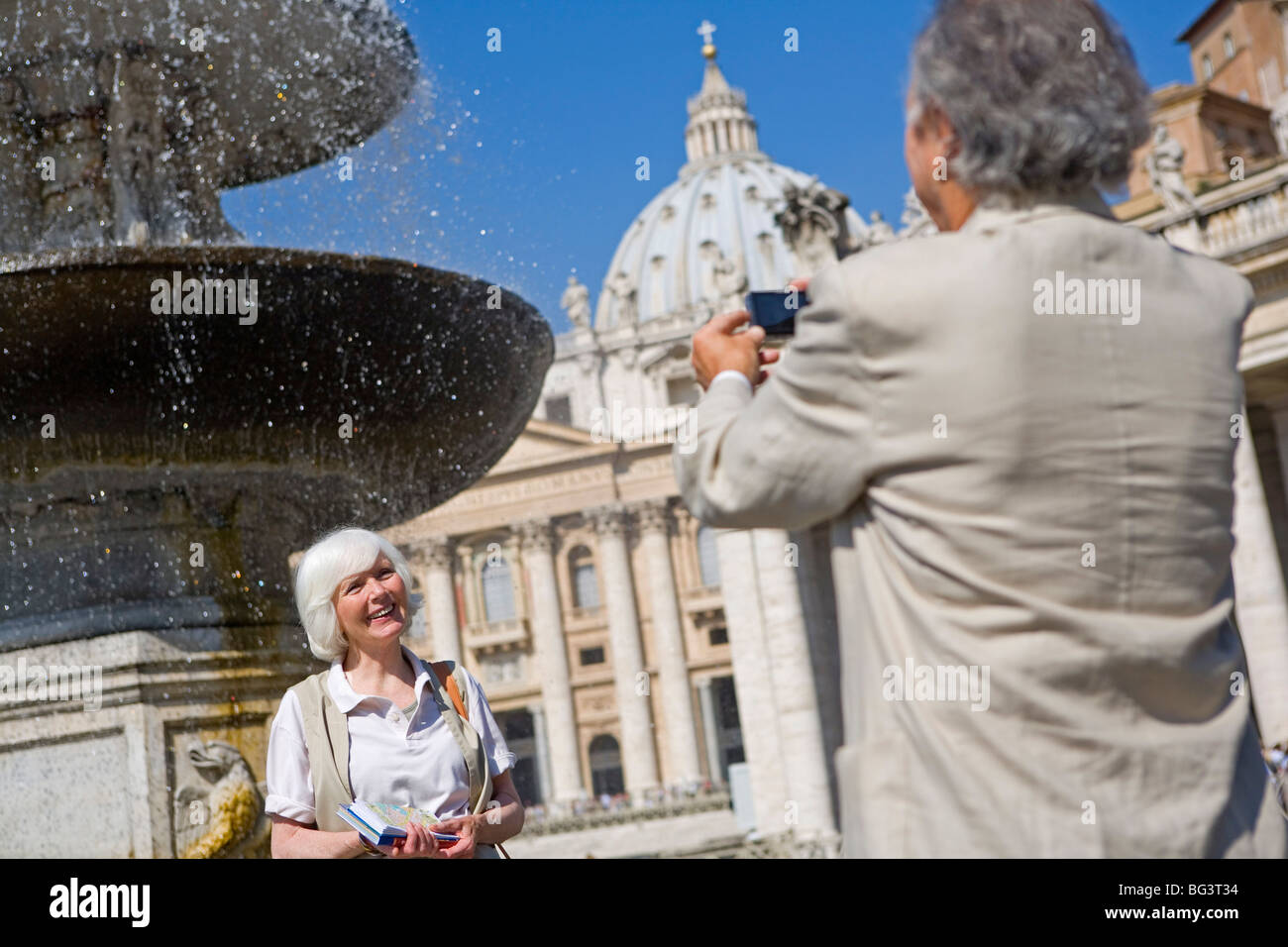 Senior tourists sightseeing in St. Peters Square, Rome, Lazio, Italy, Europe Stock Photo