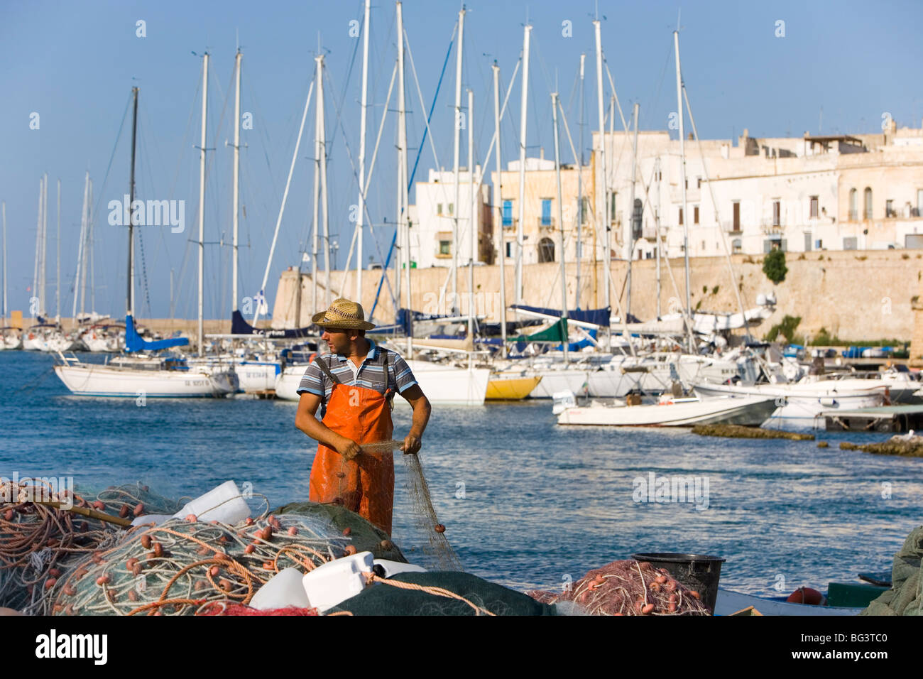 Fisherman, the castle, Gallipoli, Lecce province, Puglia, Italy, Europe Stock Photo