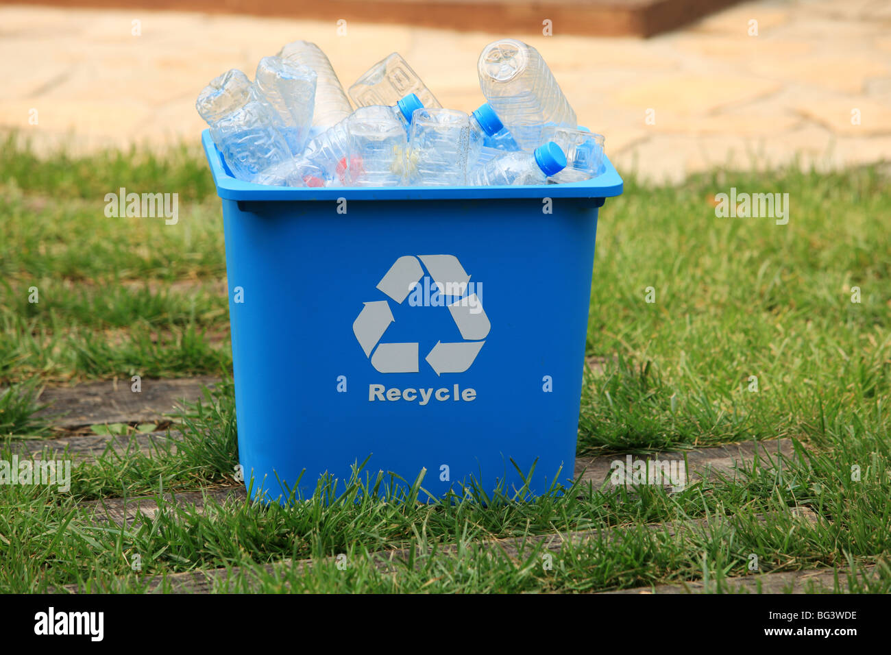 recycling container with empty plastic bottles inside Stock Photo