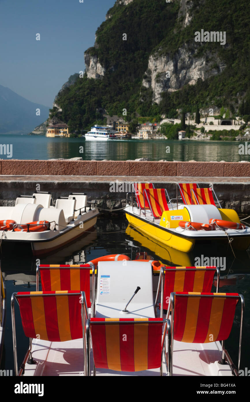 Italy, Trentino-Alto Adige, Lake District, Lake Garda, Riva del Garda, lakefront paddleboats Stock Photo