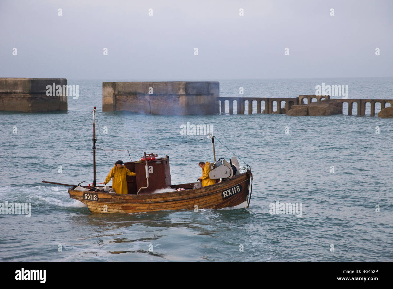 England, East Sussex, Hastings, Fishing Boat at Sea Stock Photo