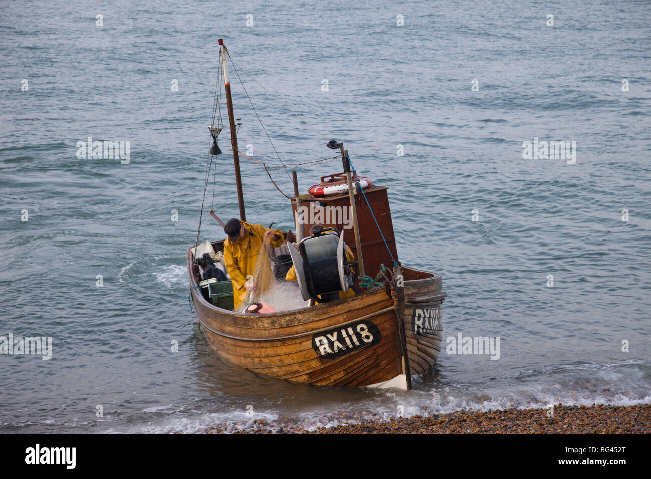 England, East Sussex, Hastings, Fishing Boat at Sea Stock Photo