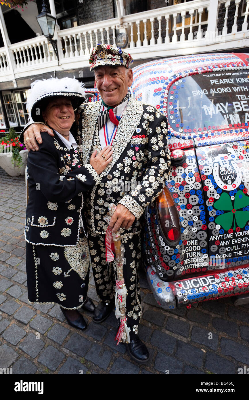 England, London, Pearly King and Queen and Decorated London Taxi Stock Photo
