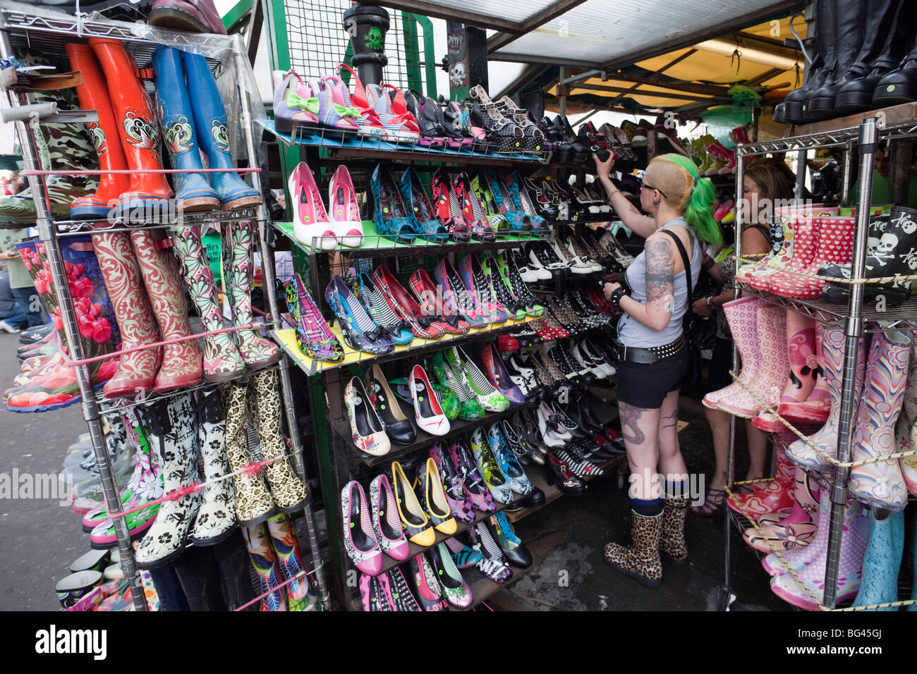 England, London, Camden, Camden High Street, Customer in Shoe Shop