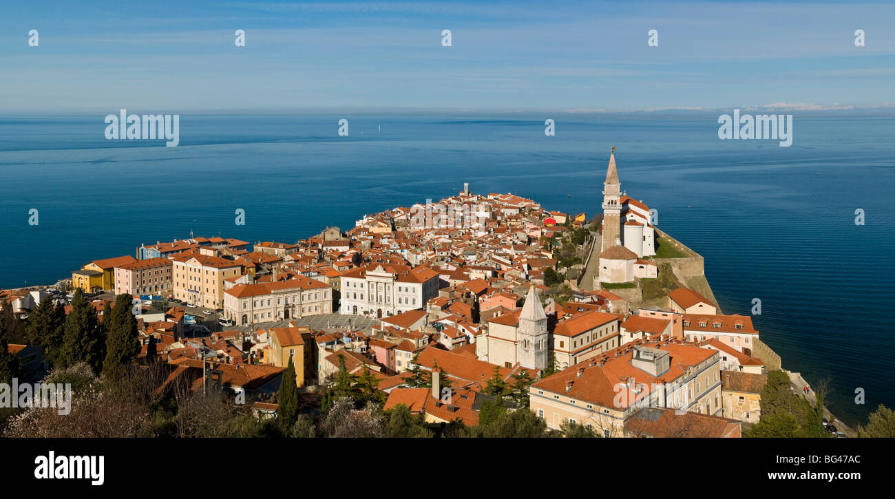 View from a hill overlooking the old town of Piran and St. George Church, Piran, Slovenvia, Europe Stock Photo