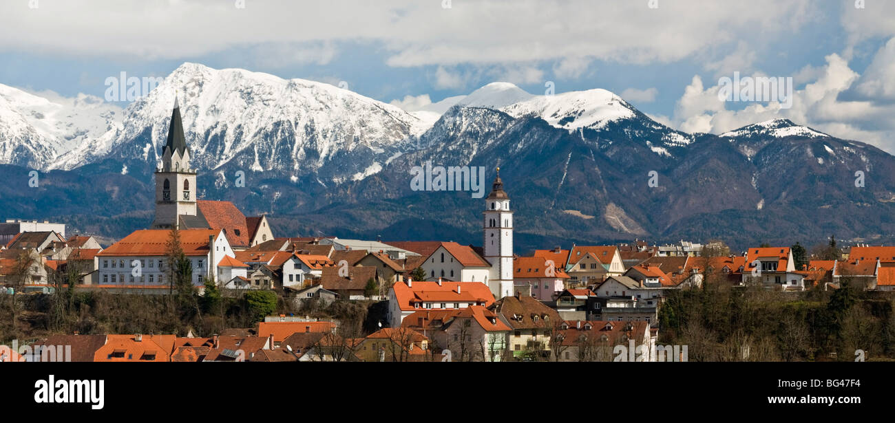 St. Cantianus Church in the foreground and the Kamnik Alps behind, Kranj, Slovenia, Europe Stock Photo