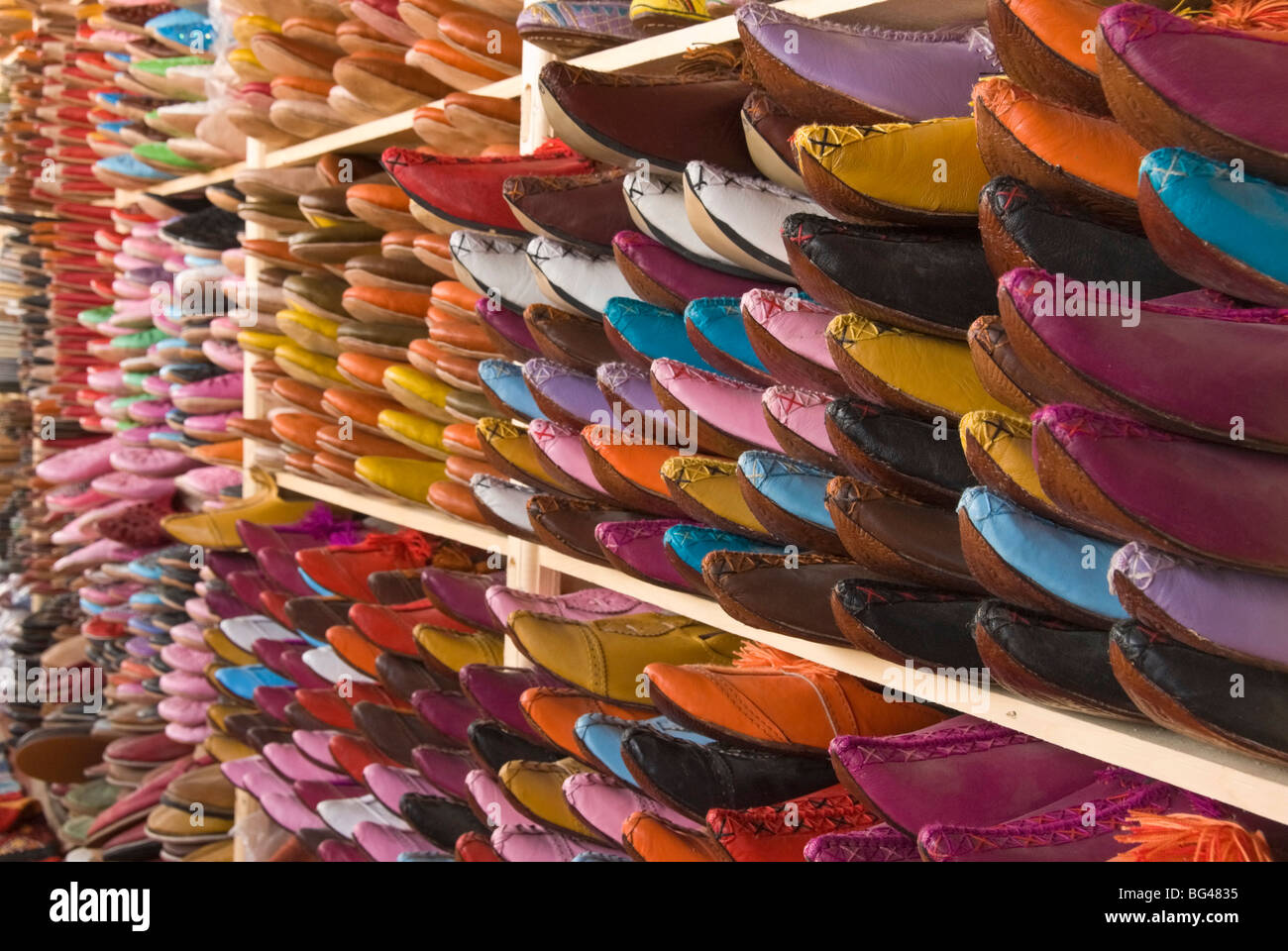 Traditional leather shoes on sale in a shop next to the tannery, Fez, Morocco, North Africa, Africa Stock Photo