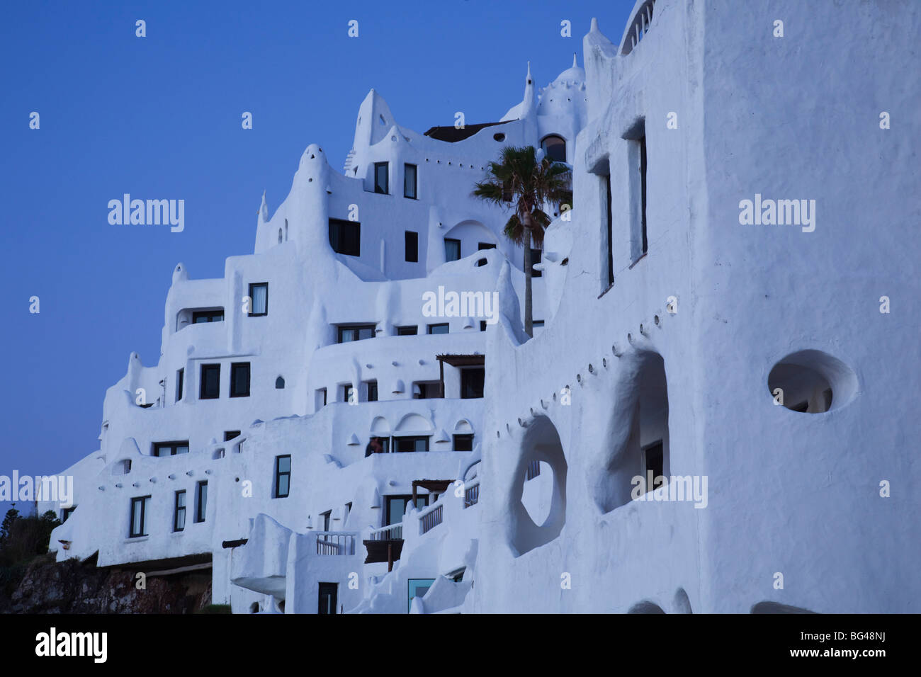 Uruguay, Punta del Este area, Punta Ballena, Casapueblo, hotel and art gallery of artist Carlos Paez Vilaro, dusk Stock Photo