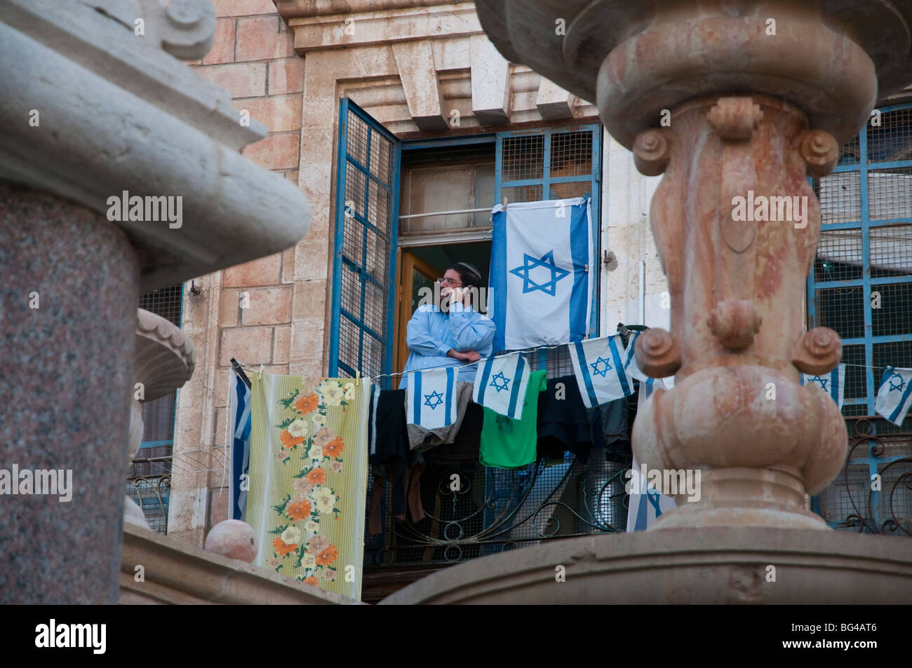Israel. Jerusalem Old City. Mauristan. Israeli settler at terrace Stock Photo