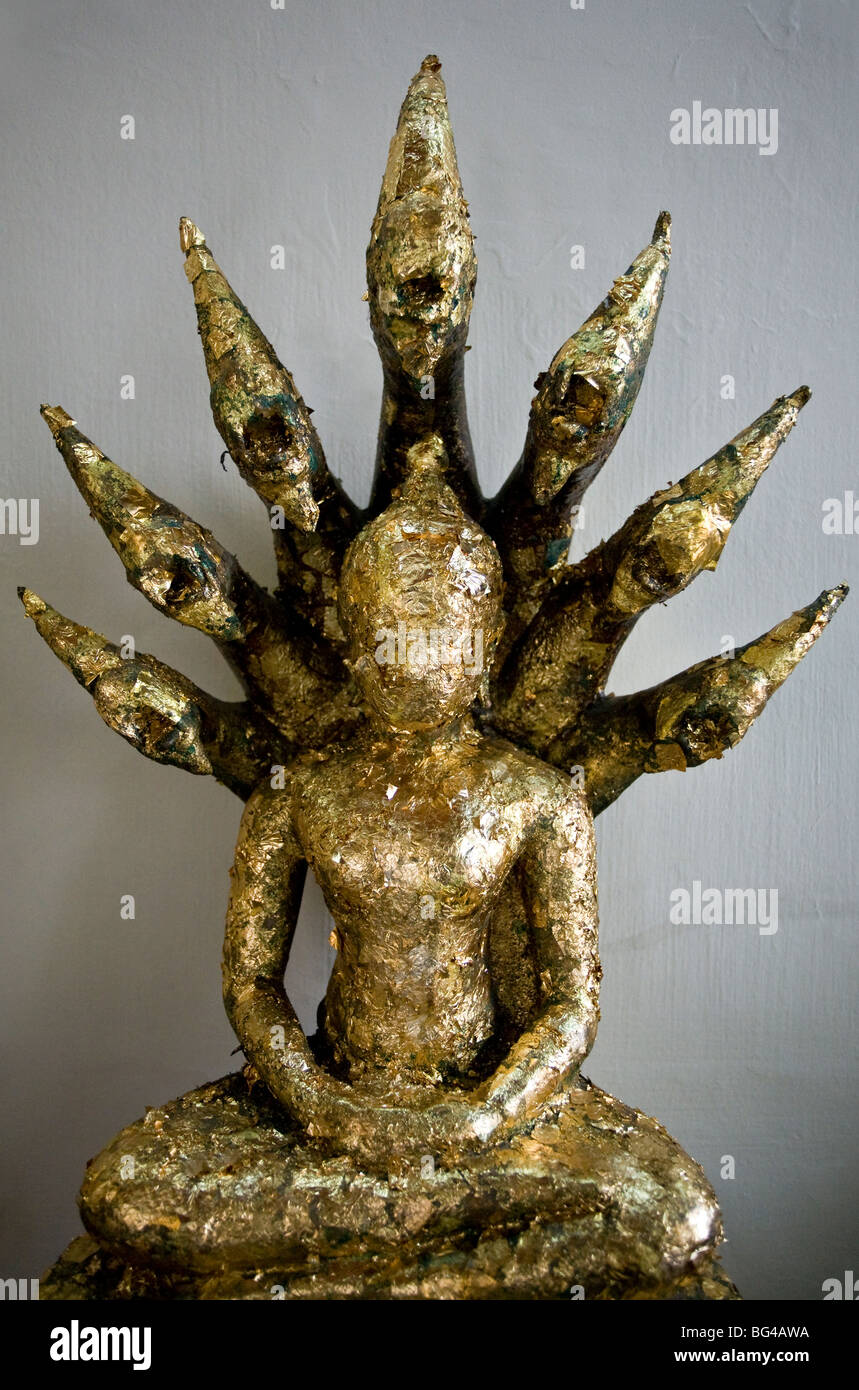 Buddha statue covered with gold leaf offered by devotees. Wat Pho. Bangkok. Thailand Stock Photo