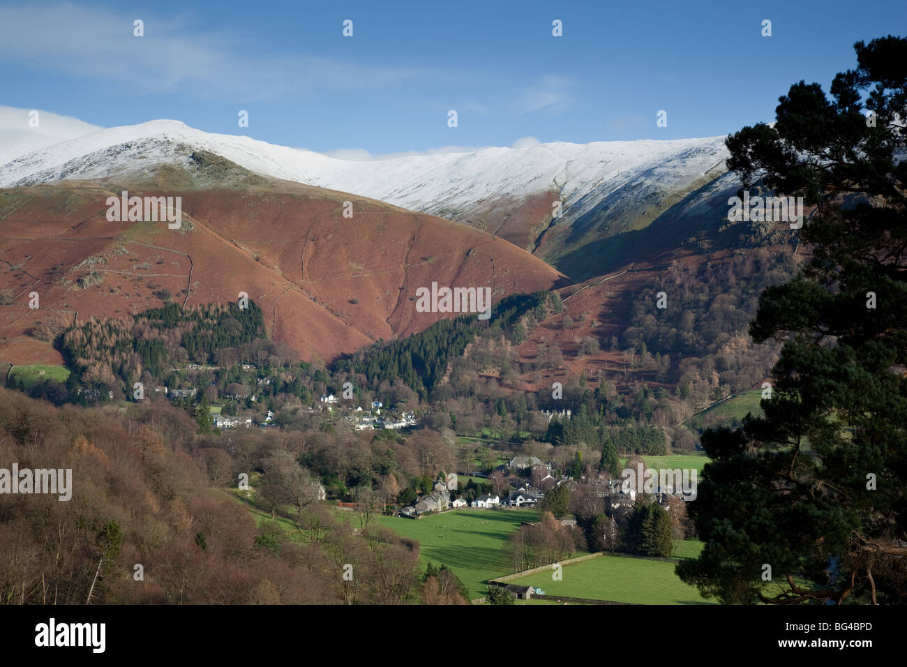 Snow capped Heron Pike and Great Rigg above Grasmere, Lake District, Cumbria Stock Photo