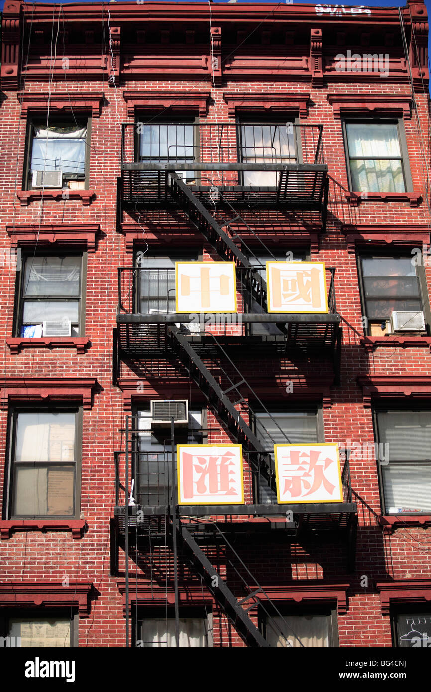 Classic old tenement building with fire escape, Chinatown, Manhattan, New York City, United States of America, North America Stock Photo