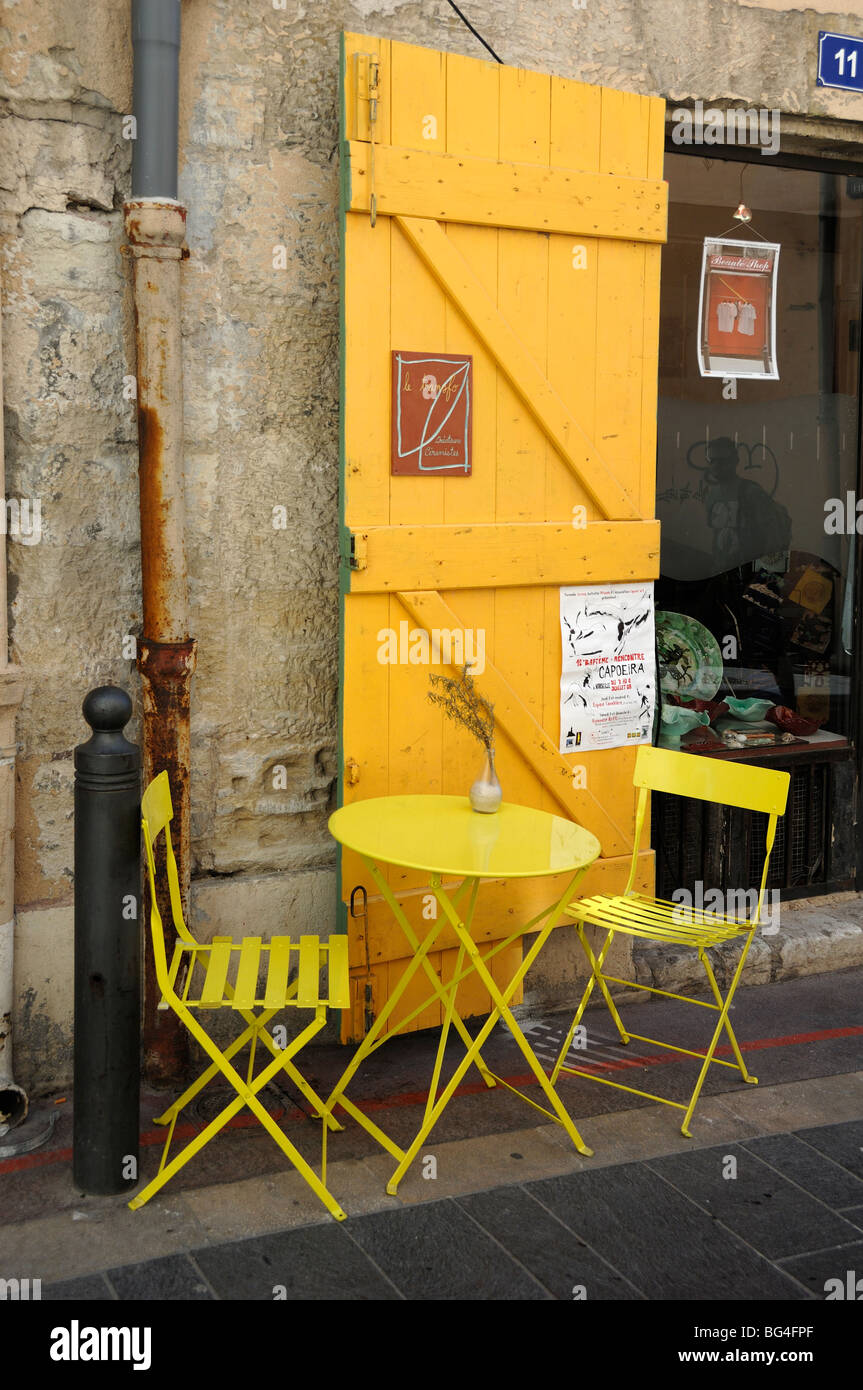 Yellow Table Door & Chairs Outside Cafe or Restaurant in Le Panier Old Town, Marseille, Provence, France Stock Photo