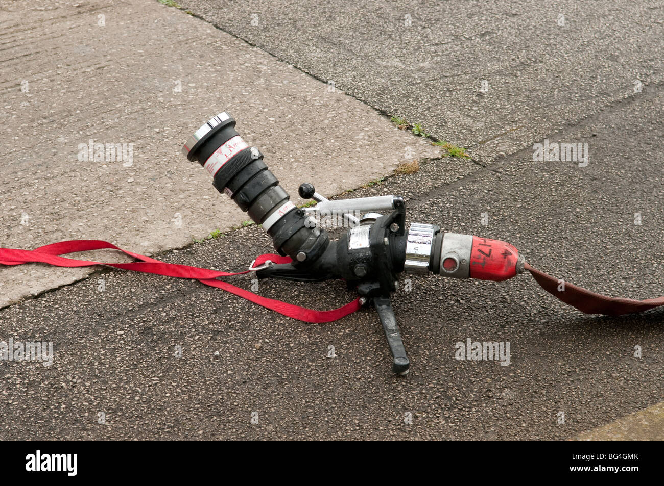 Fire brigade Akron ground monitor with hose Stock Photo