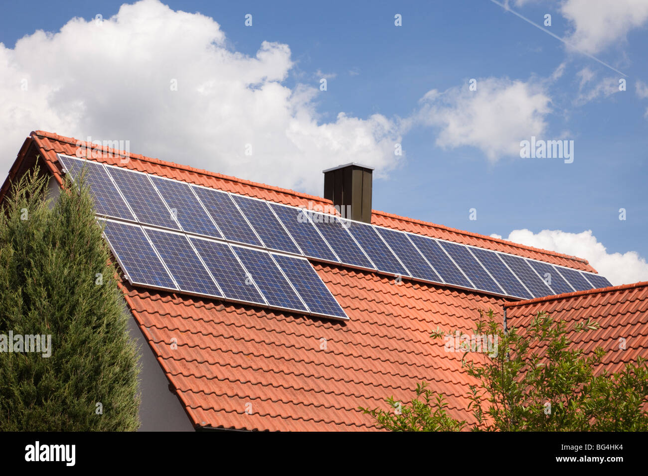 Photovoltaic solar panels on a house roof on a sunny day. Bavaria