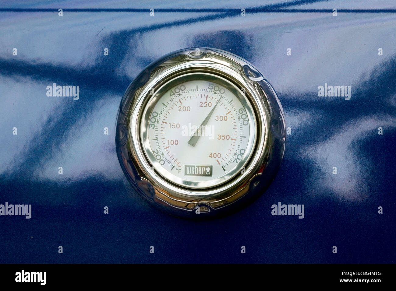 Temperature gauge, on blue er Genesis bbq Stock Photo Alamy