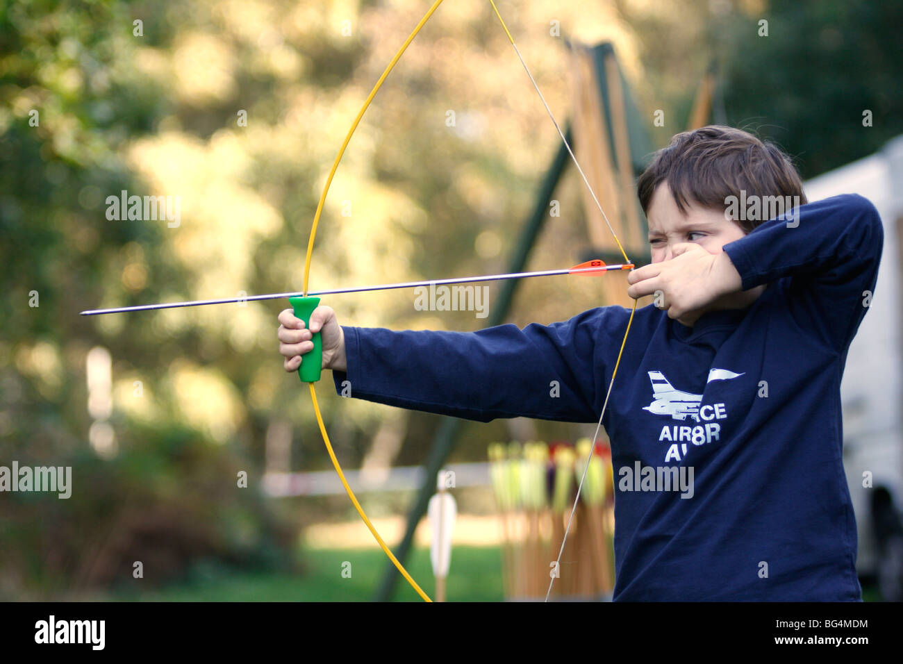 Sherwood Forest. Lewis aged 8 undergoing archery tuition from Rod