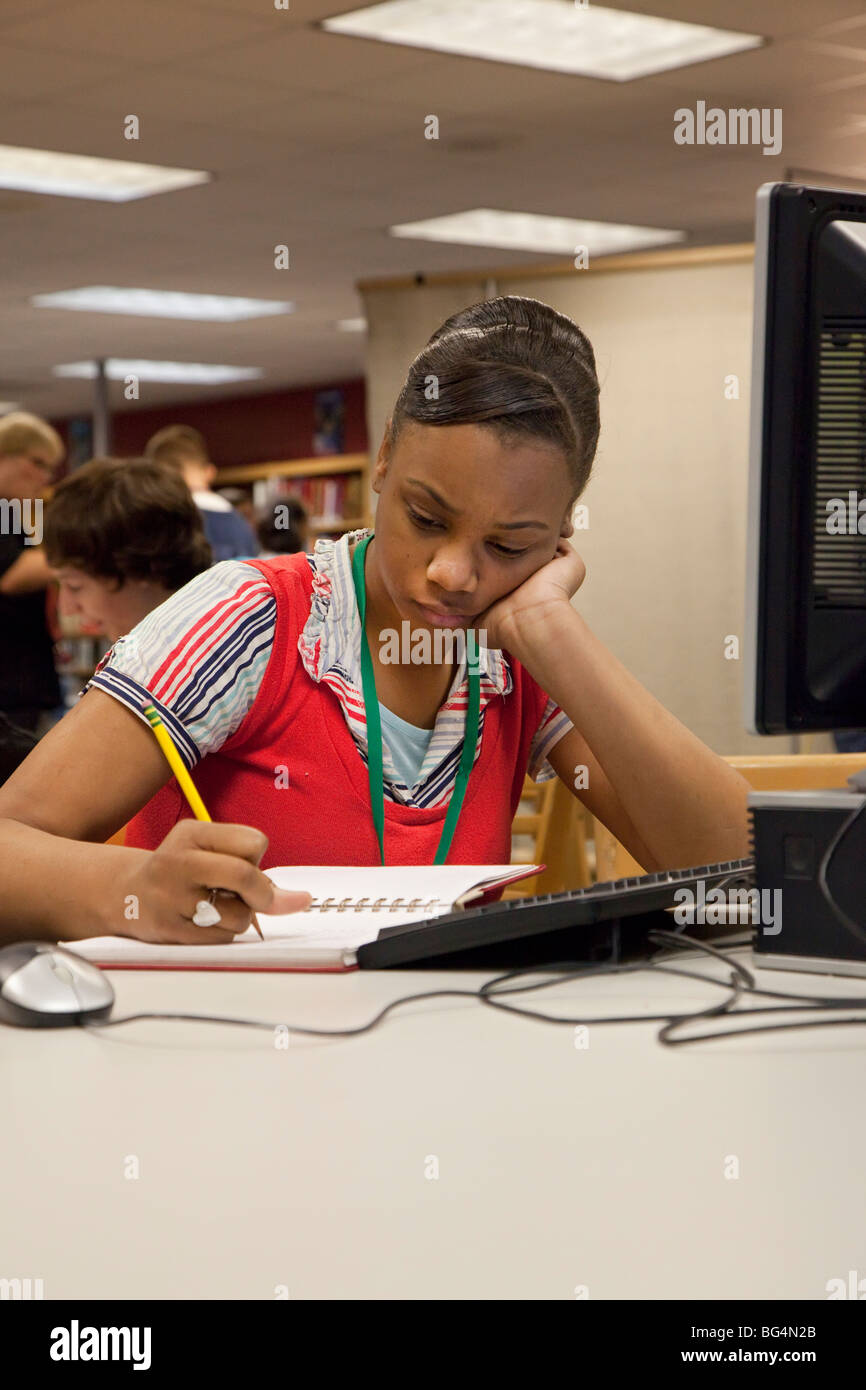 St. Clair Shores, Michigan - A student studies in the media center (library) at Lake Shore High School. Stock Photo