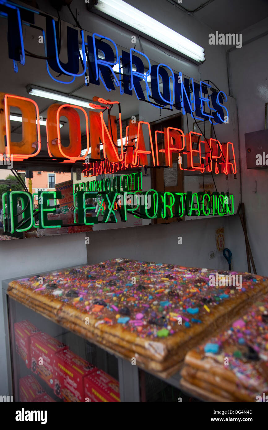 Turron de Dona Pepa, a layered nougat covered in syrup and candy, being sold at the Senor de Milagros Procession in Lima, Peru. Stock Photo