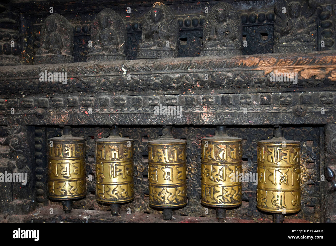 Ancient brass prayer wheels at the Swayambhunath Stupa Temple in ...