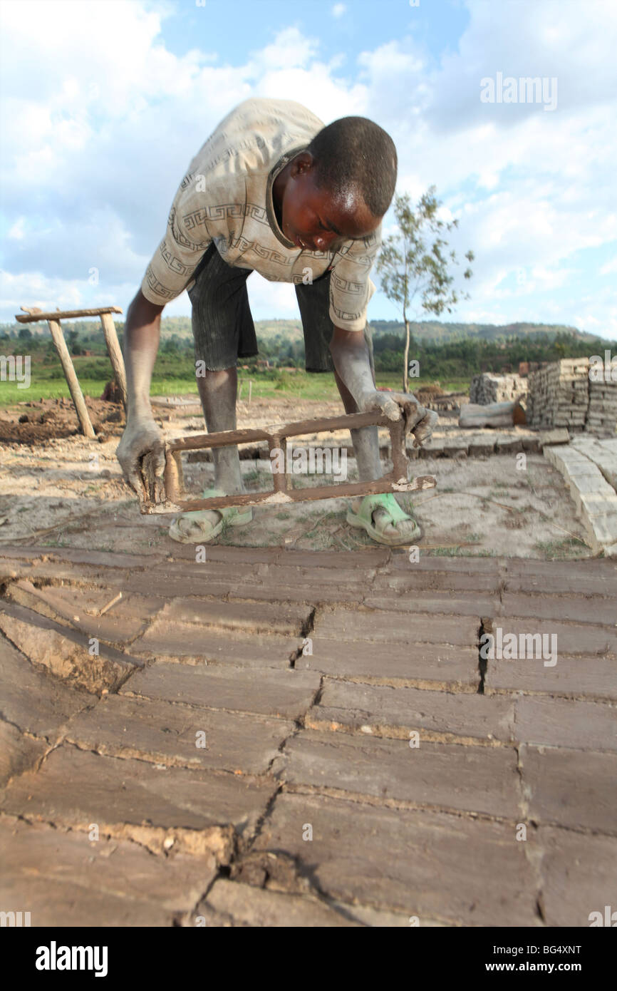 During the war in Burundi half a million people fled to Tanzania.Now they return ands rebuild their homes Stock Photo