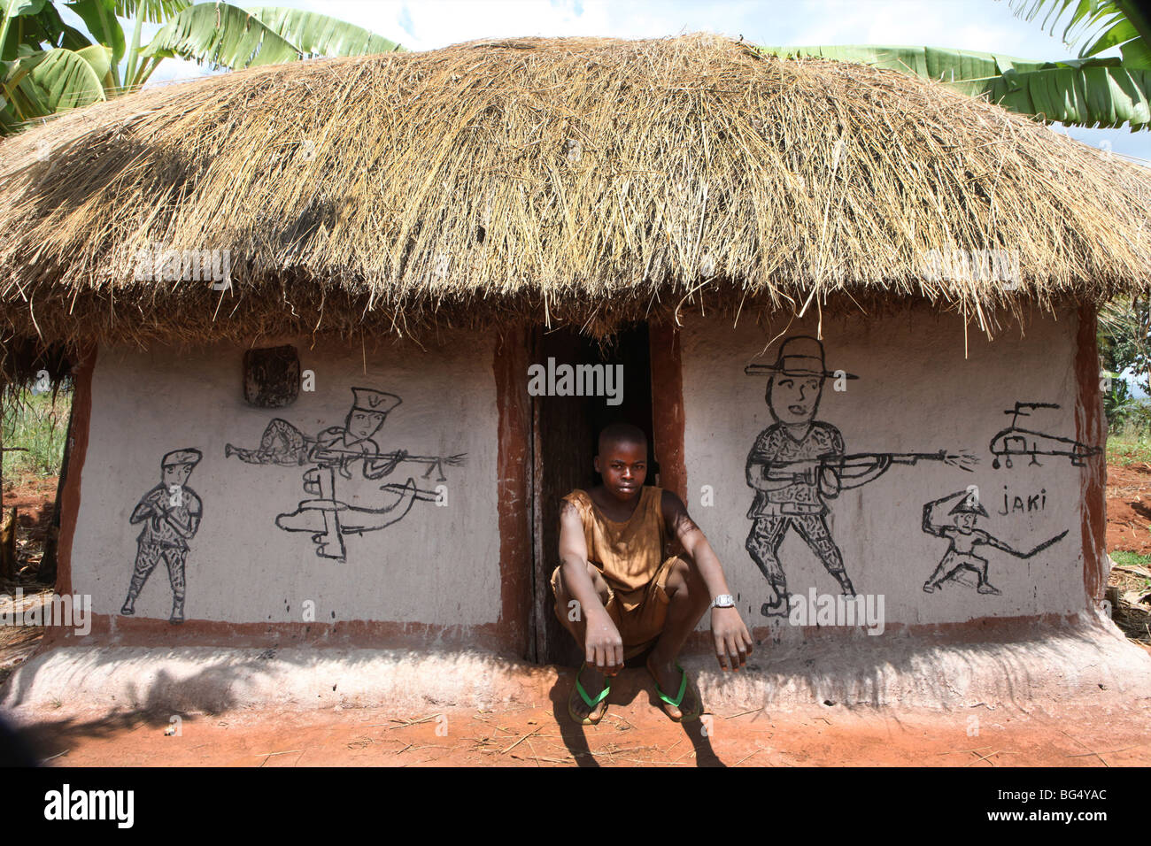 During the war in Burundi half a million people fled to Tanzania.Now they return ands rebuild their homes Stock Photo