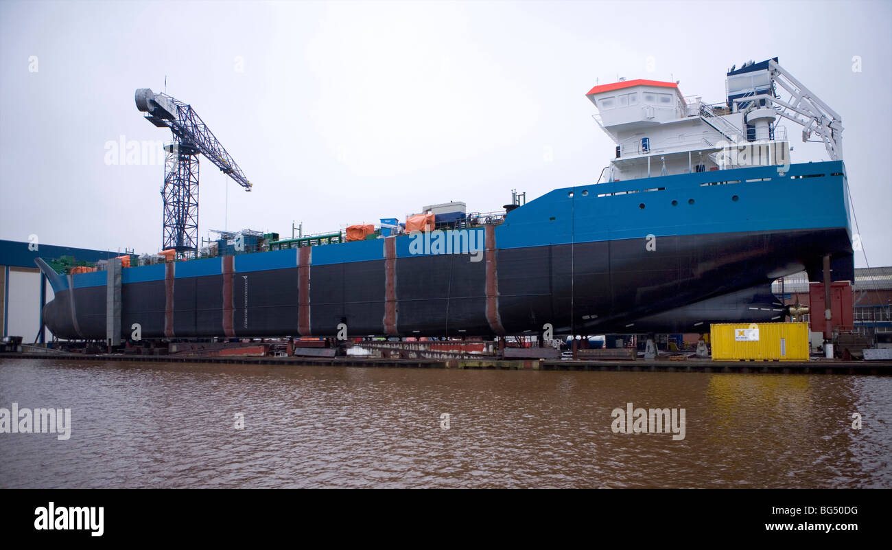 Construction of a ship is completed at a shipyard, Groningen, the netherlands Stock Photo