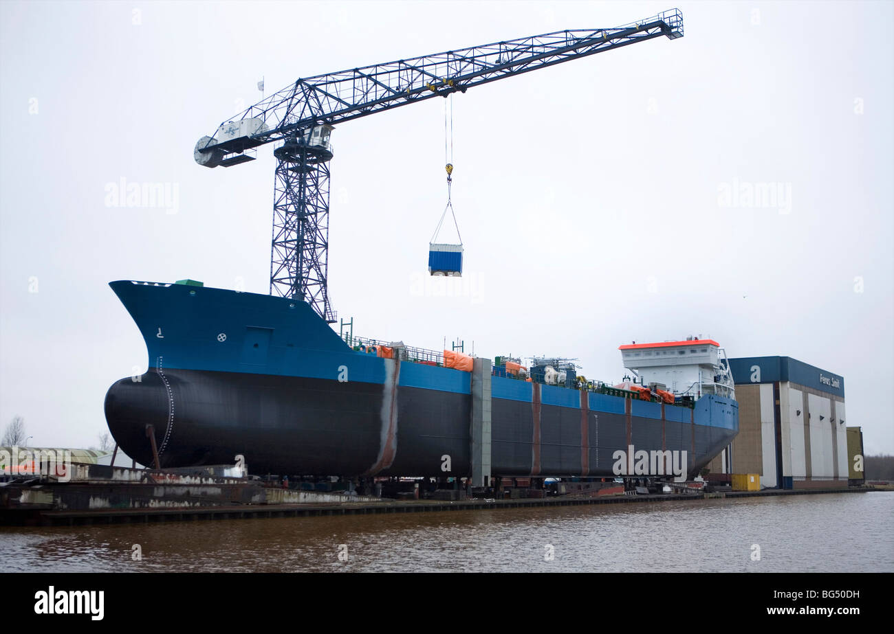 Construction of a ship is completed at a shipyard, Groningen, the netherlands Stock Photo