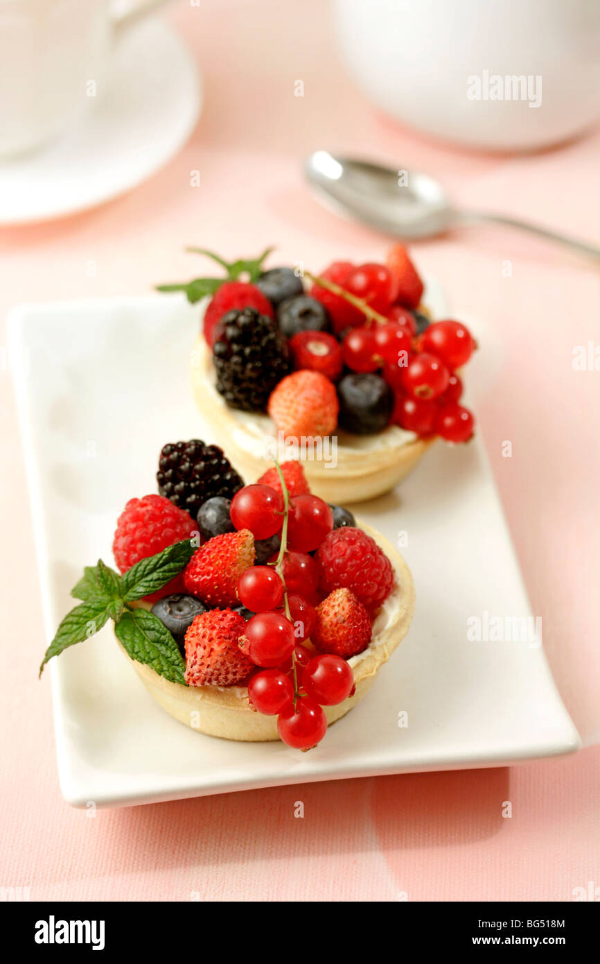 Berries tartlets. Recipe available Stock Photo - Alamy