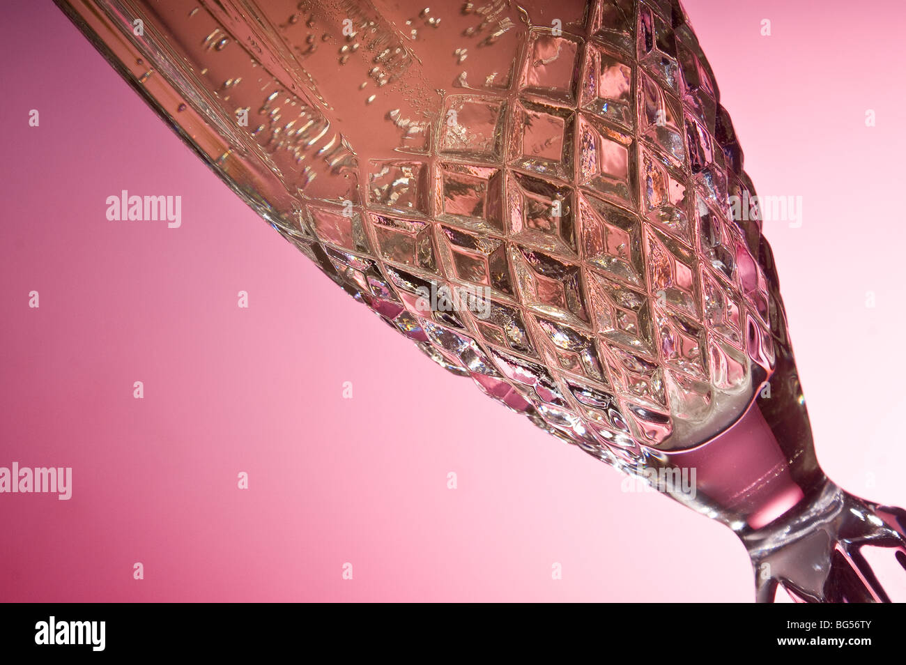 Champagne with red background Stock Photo - Alamy