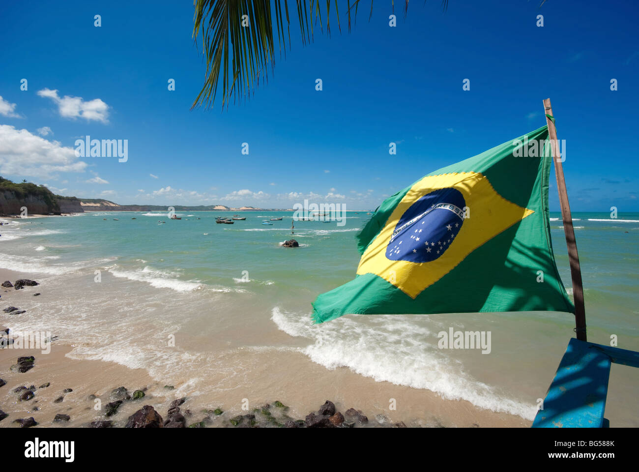 Flag with the Brazilian colors at Pipa beach Brazil Stock Photo
