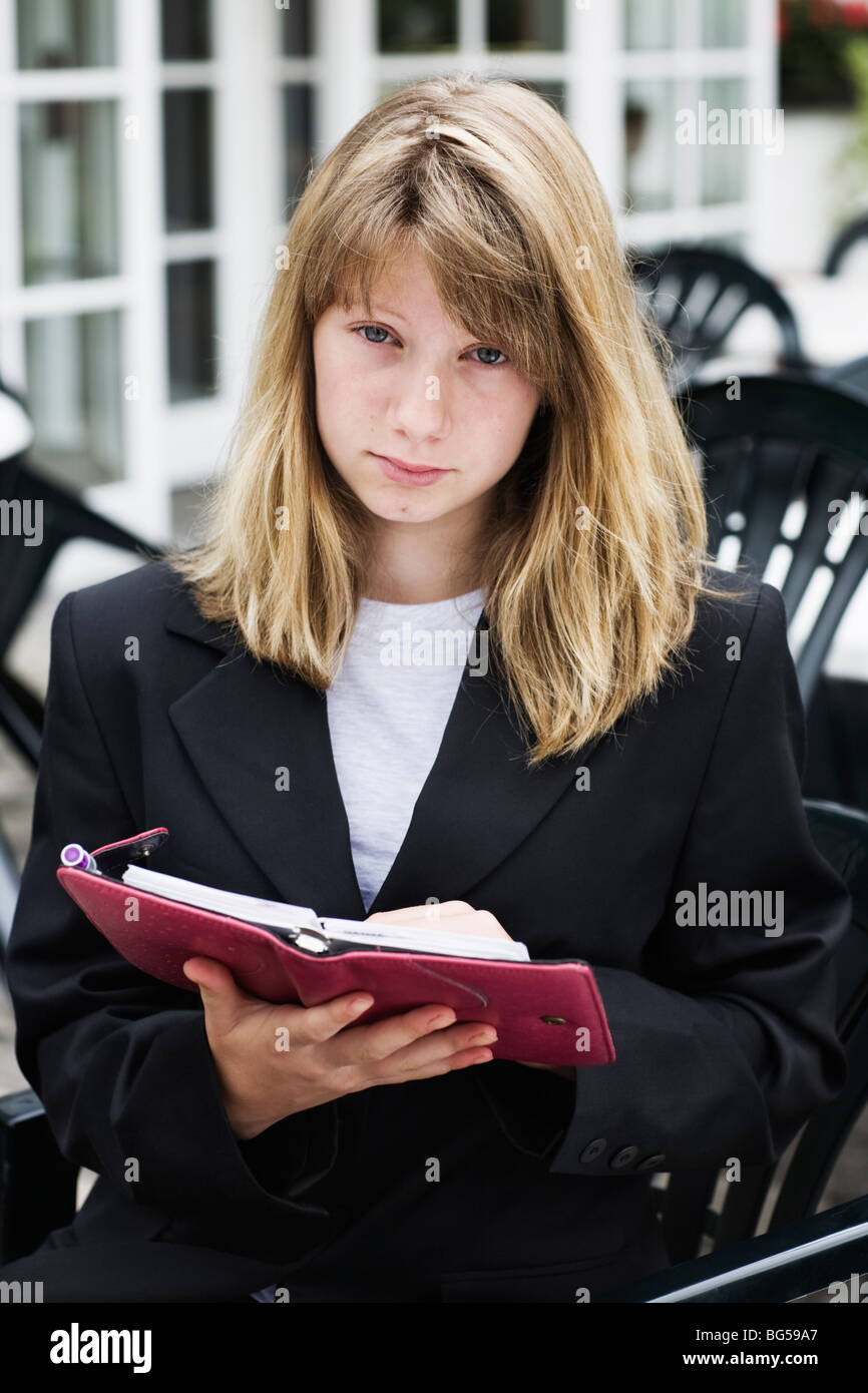 Teenage girl with personal organizer Stock Photo