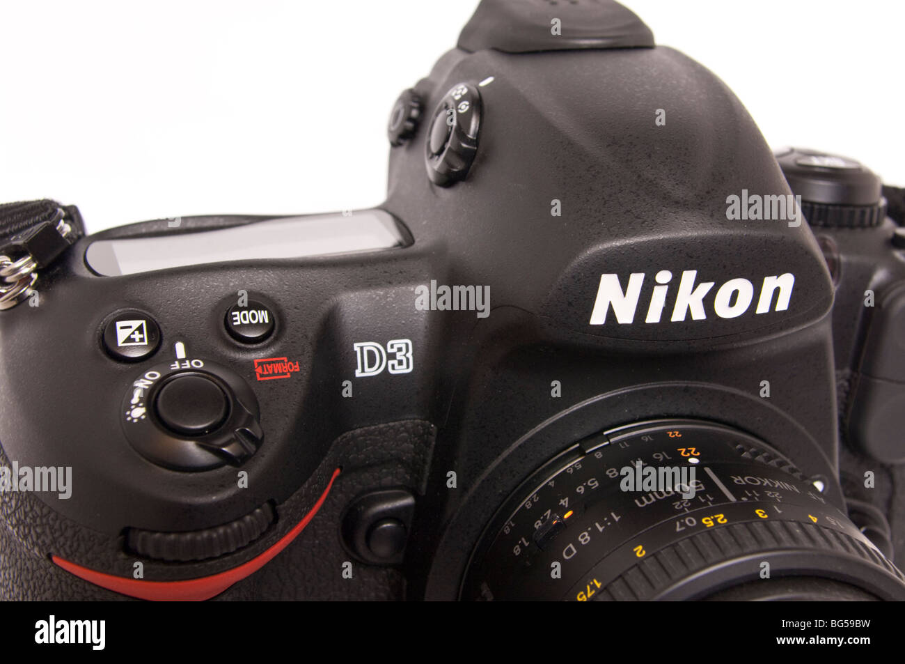 A Nikon D3 digital DSLR full frame (FX) flagship model professional camera with 50mm lens attatched on a white background Stock Photo