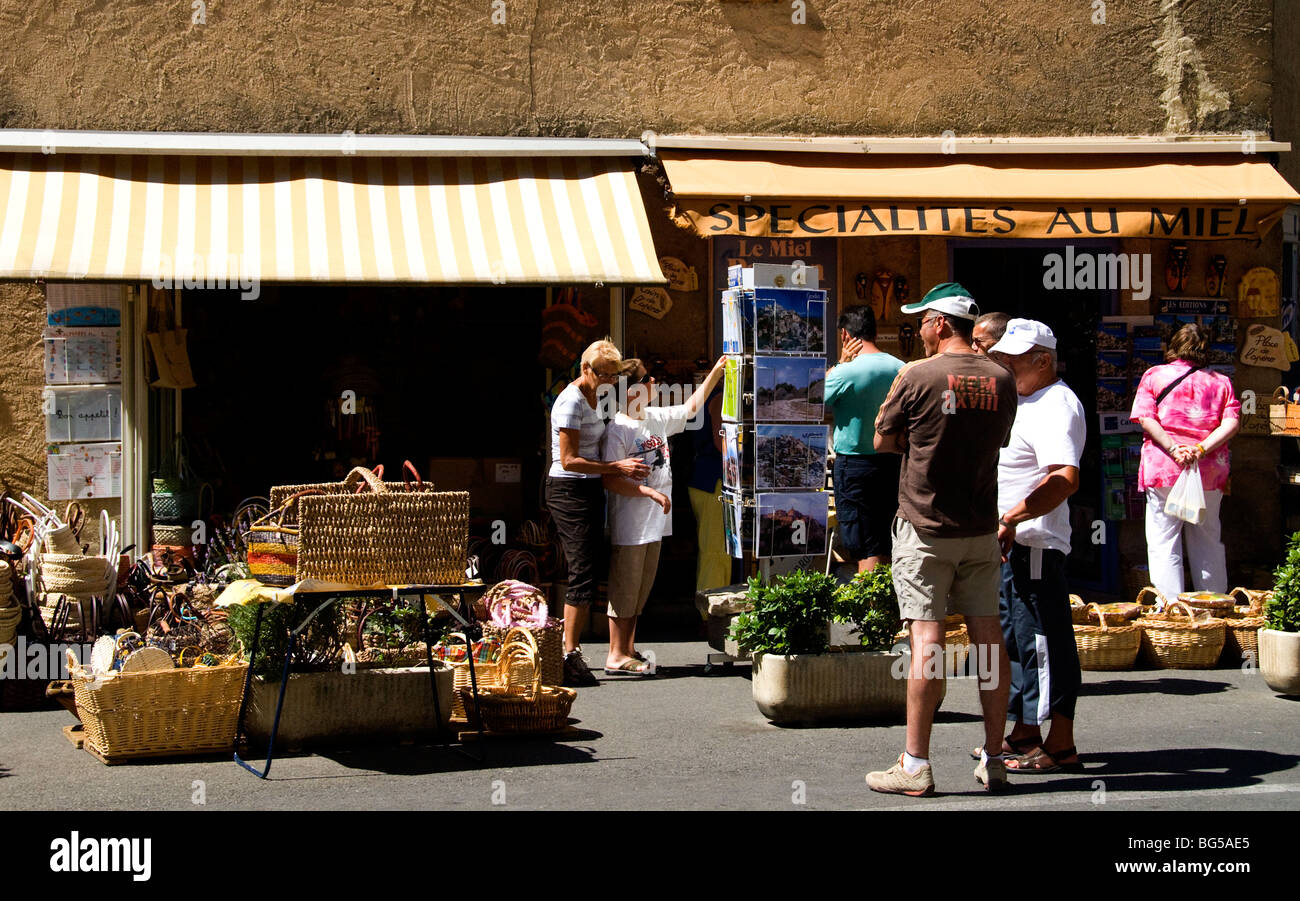 Shoppers at openair market in Gordes, Provence, France Stock Photo Alamy