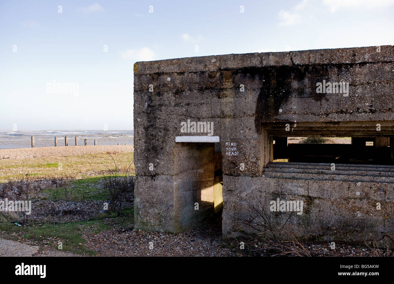 The entrance to a concrete pill box on the coast near Rye Harbour in East Sussex.  Photo by Gordon Scammell Stock Photo