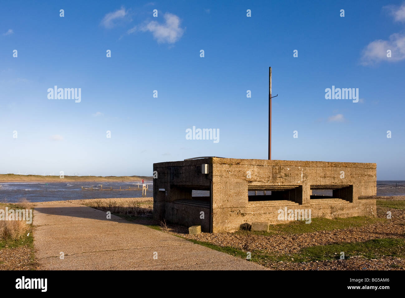 A pill box guarding the entrance to Rye Harbour in East Sussex.  Photo by Gordon Scammell Stock Photo