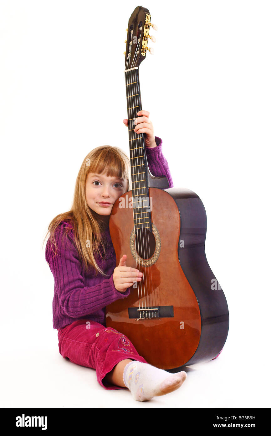 Young girl playing acoustic guitar Stock Photo - Alamy
