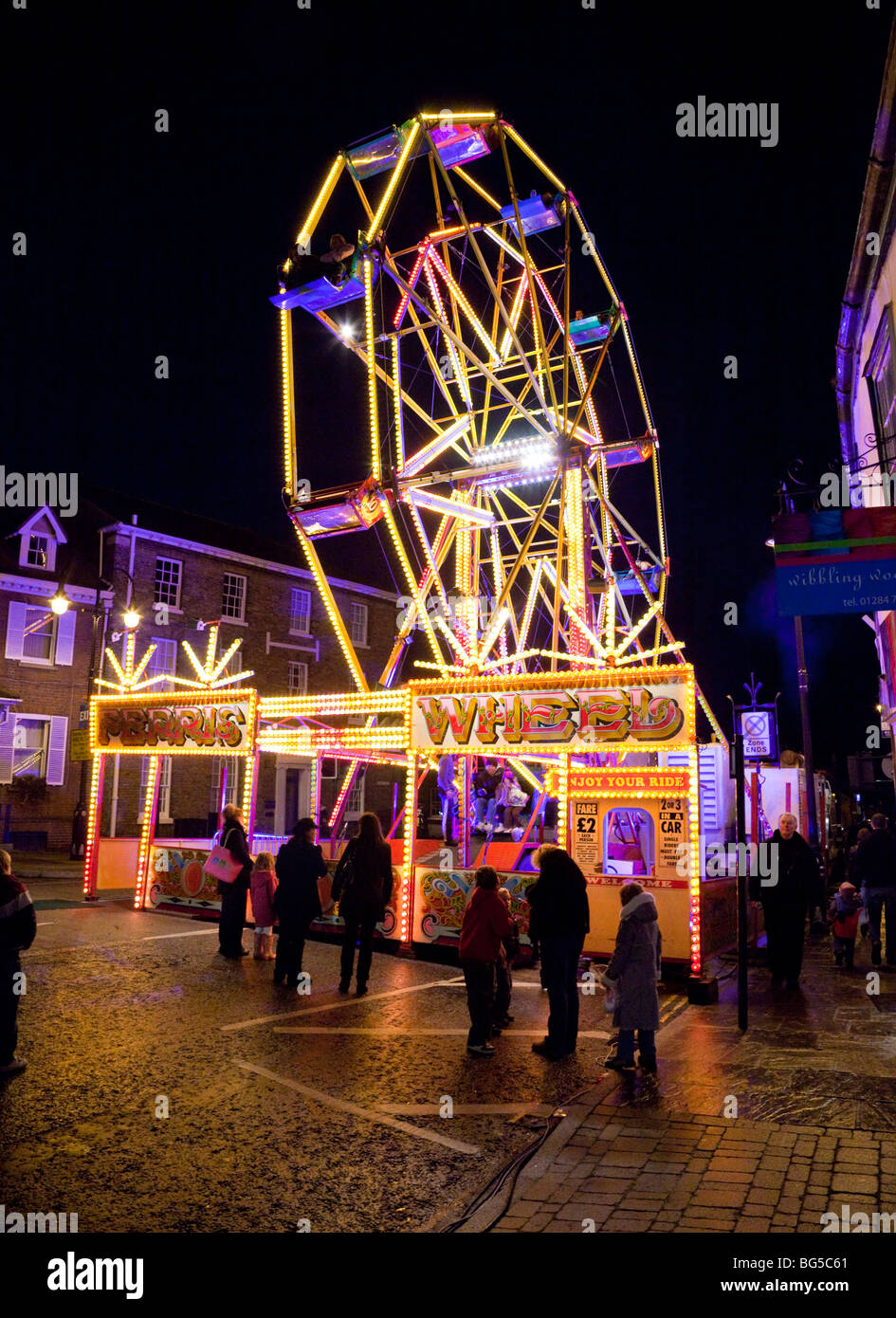 at funfair at night Stock Photo