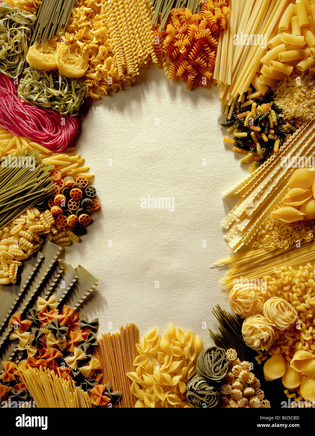 Assorted dried and fresh pastas in a border Stock Photo