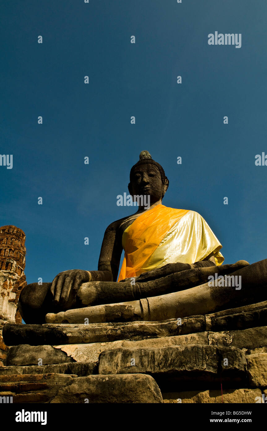 A beautiful old stone statue of Buddha in Wat Mahathat temple in Ayutthaya. Stock Photo