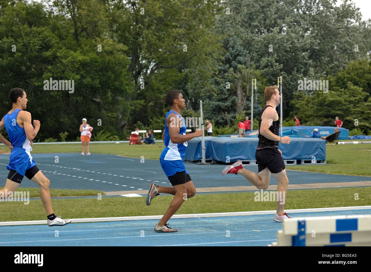 Young adult male runners at the Track and Field competition during the