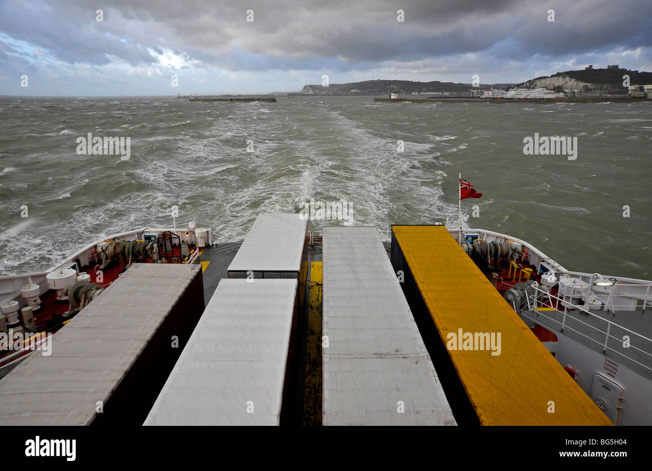 Cross channel ferry leaving dover port in stormy seas. Stock Photo