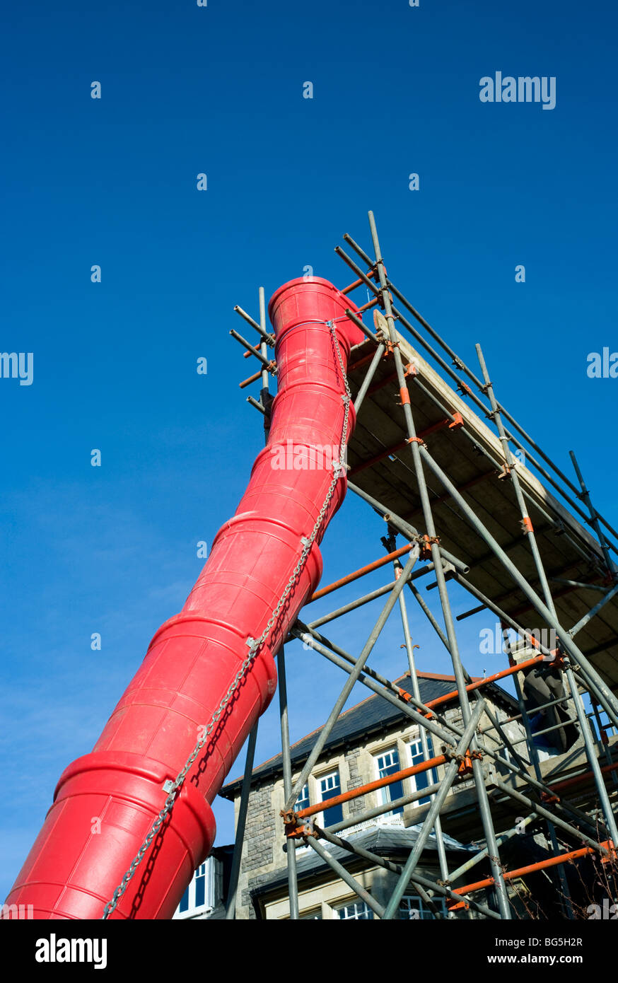 Builders' rubbish chute Stock Photo Alamy