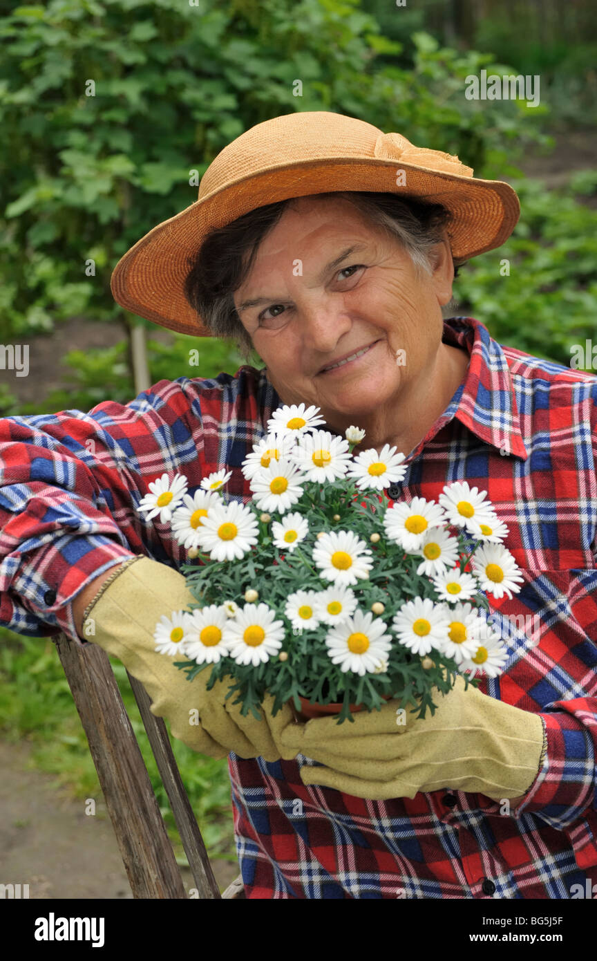 Senior woman gardening Stock Photo