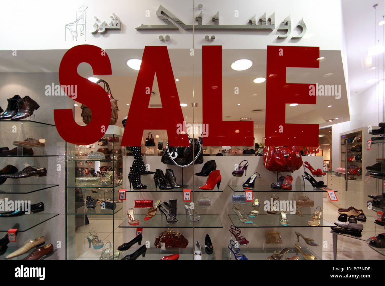 Sale in a shoe shop in the Mercato Shopping Mall, Dubai, United Arab Emirates Stock Photo