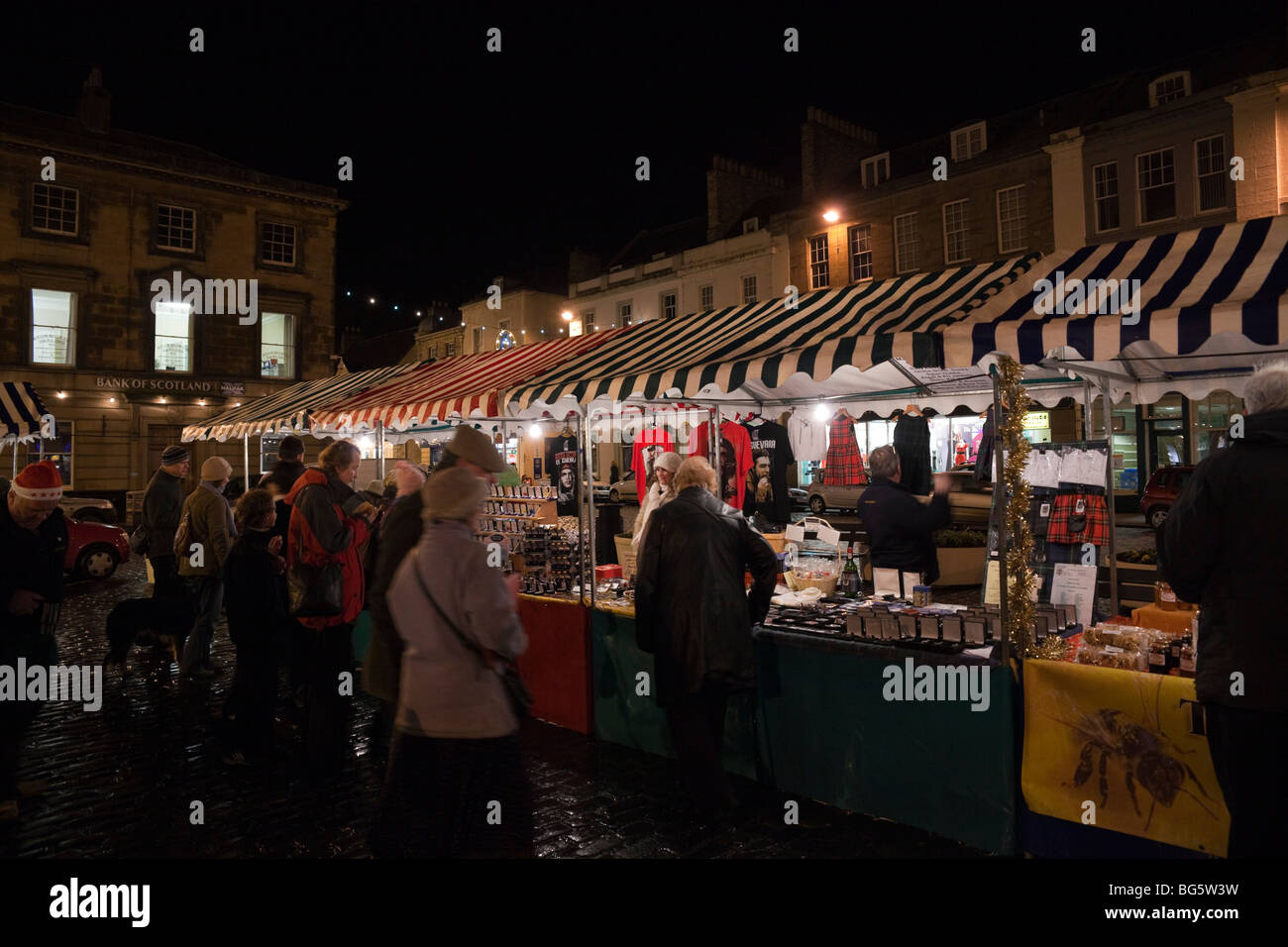 Pre Christmas late shopping in Scottish town of Kelso farmers market