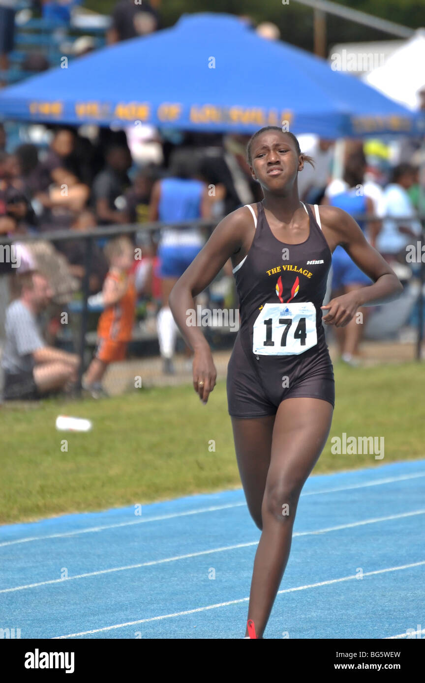 Teenage female runner at the Track and Field competition during the