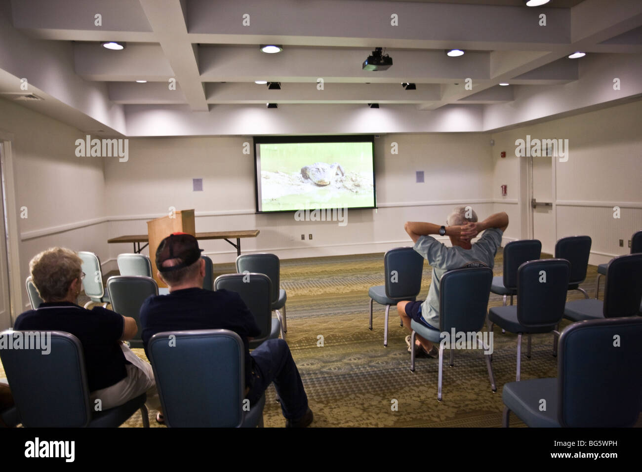 Visitors view a documentary film in the Auditorium of South Padre