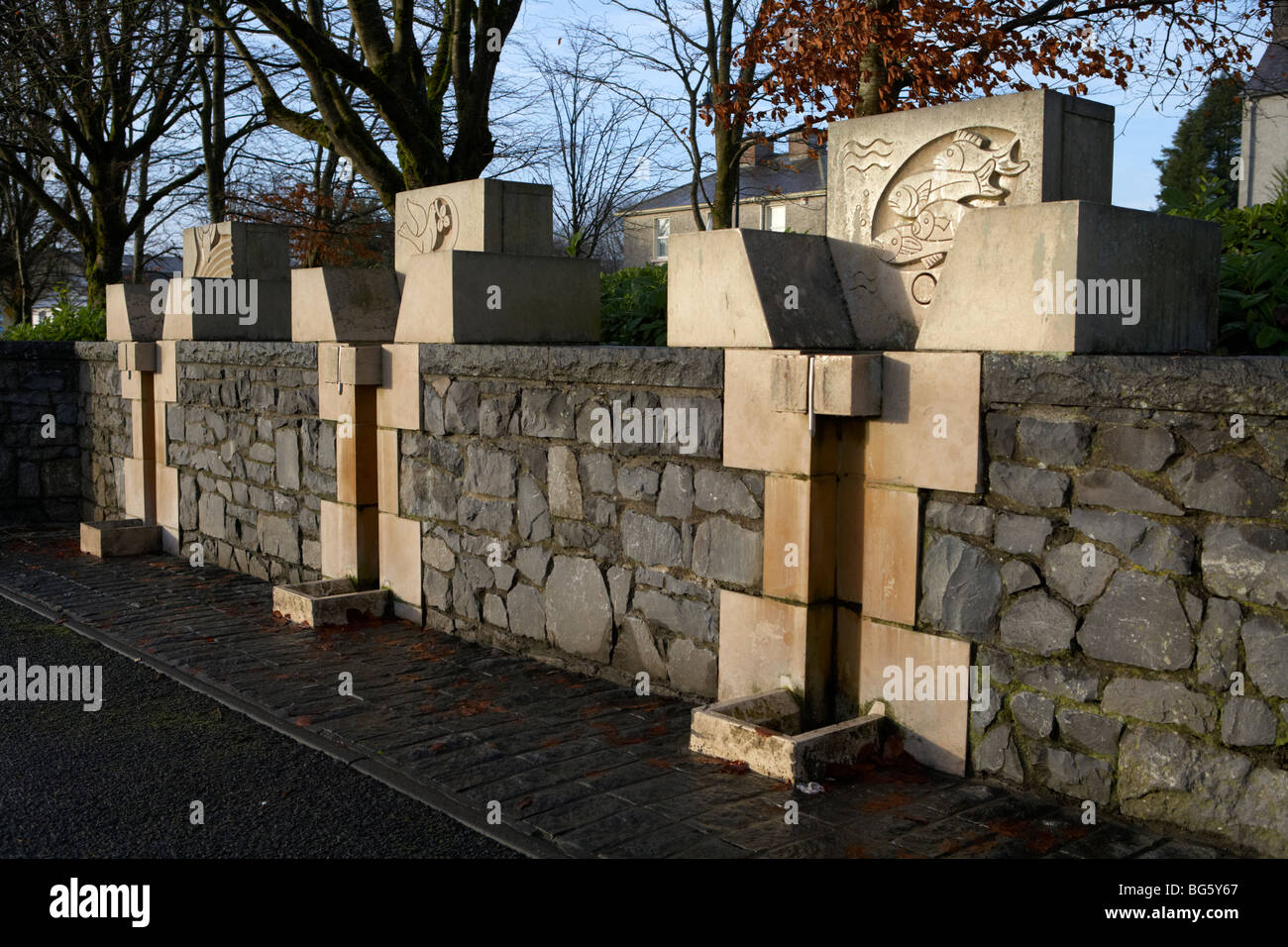 rows of holy water fountains at knock marian shrine county mayo republic of ireland Stock Photo