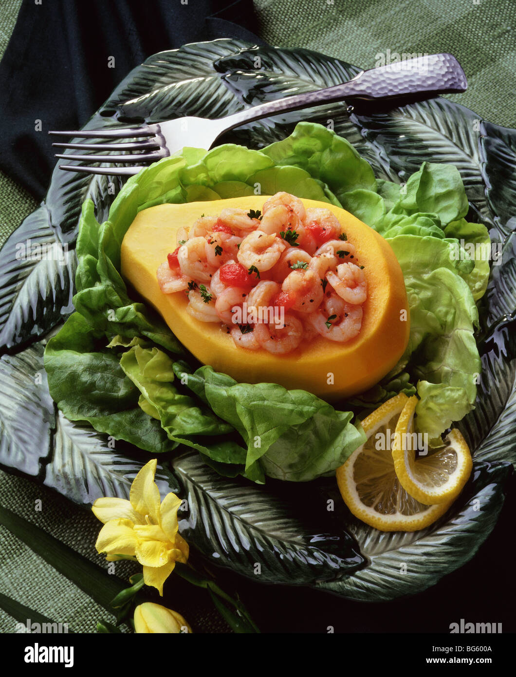 Spicy shrimp salad stuffed papaya Stock Photo